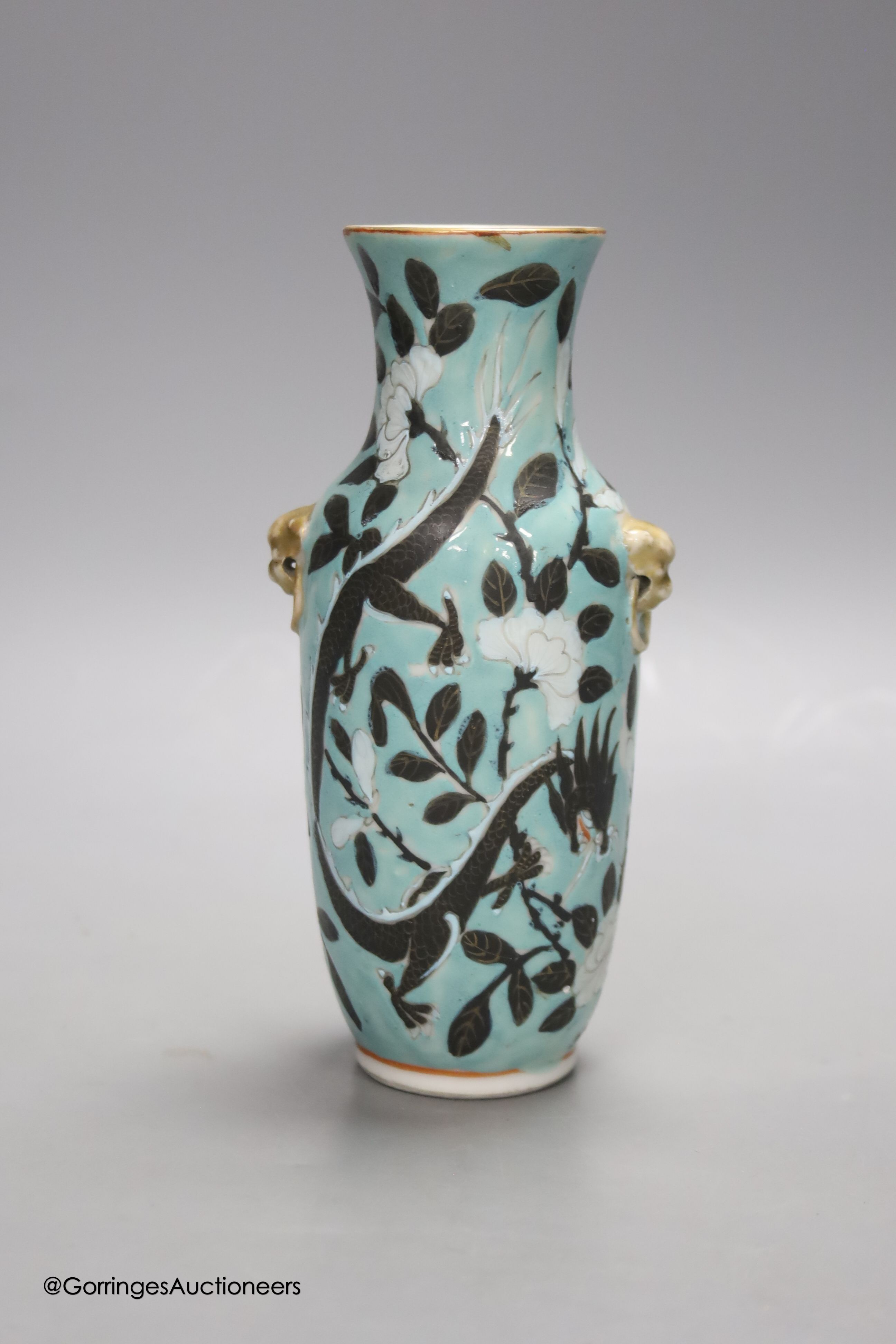 A Chinese turquoise glazed 'dragon' vase, c.1900, height 18cm